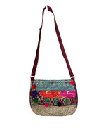 Bright Patchwork Shoulder Bag with Pom Pom details