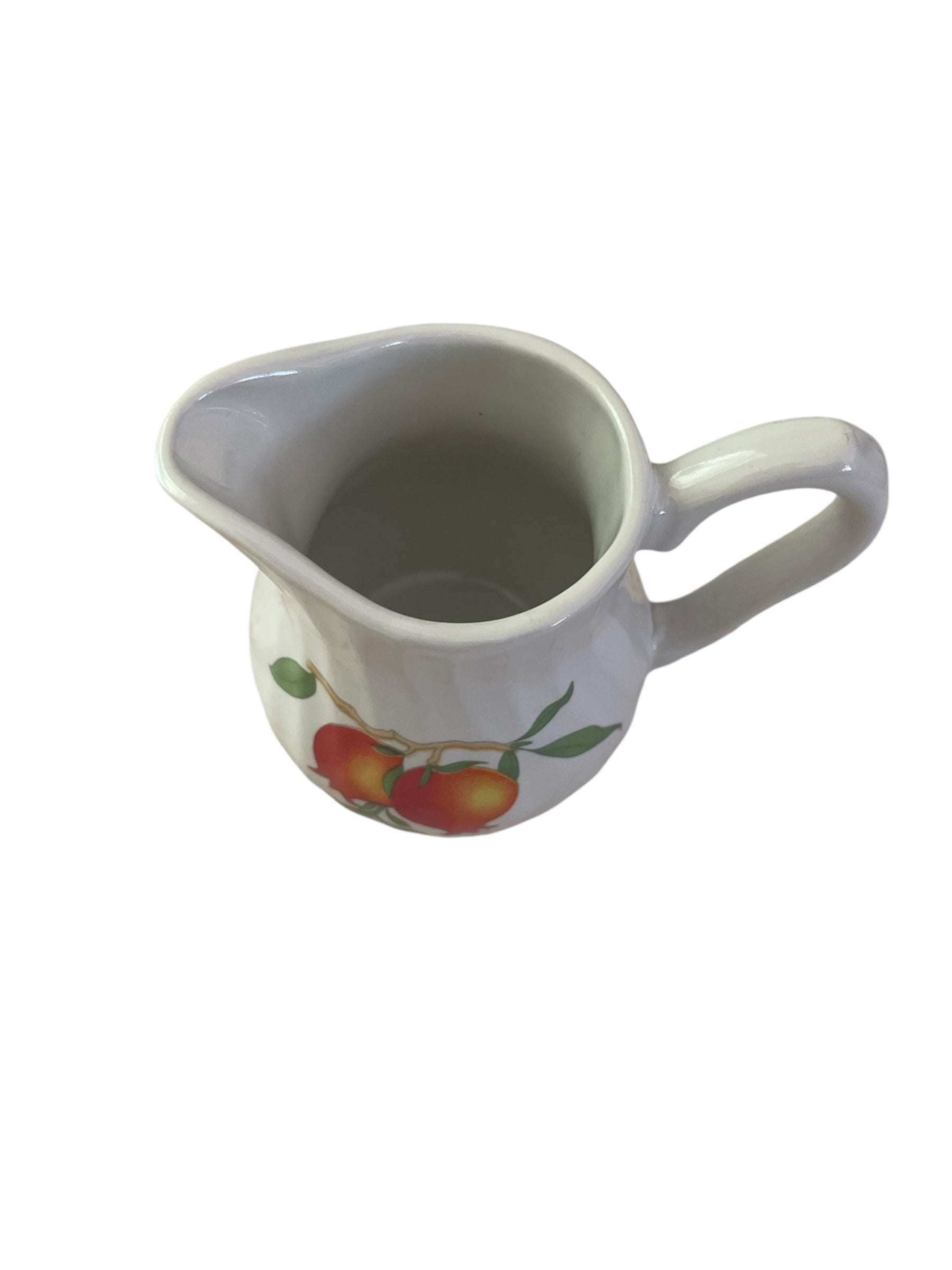 Mini porcelain creamer with orange flowers