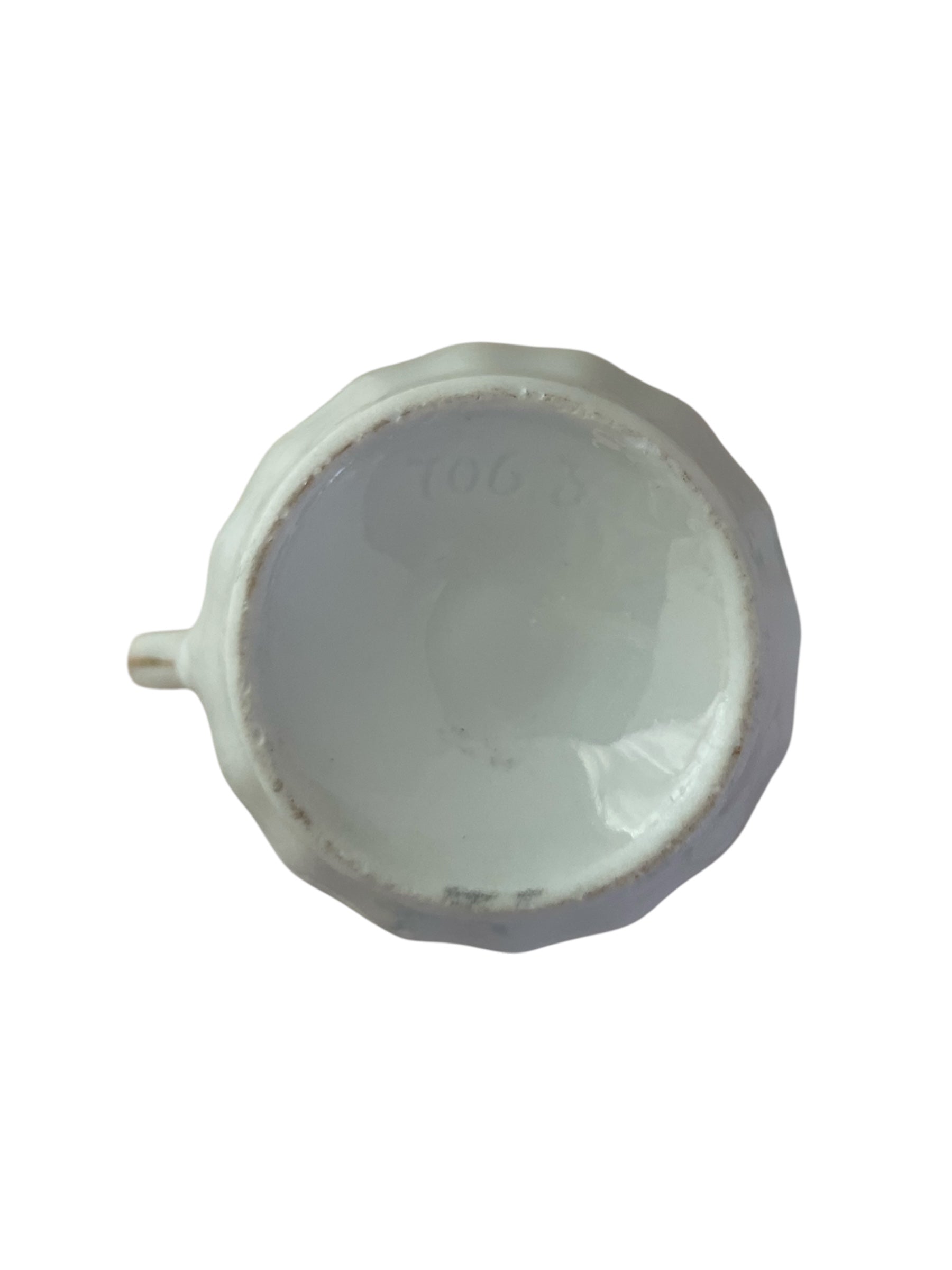 Vintage small creamer with bright floral design