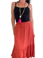 Long wood & white bead necklace with stone butterfly & pink tassel