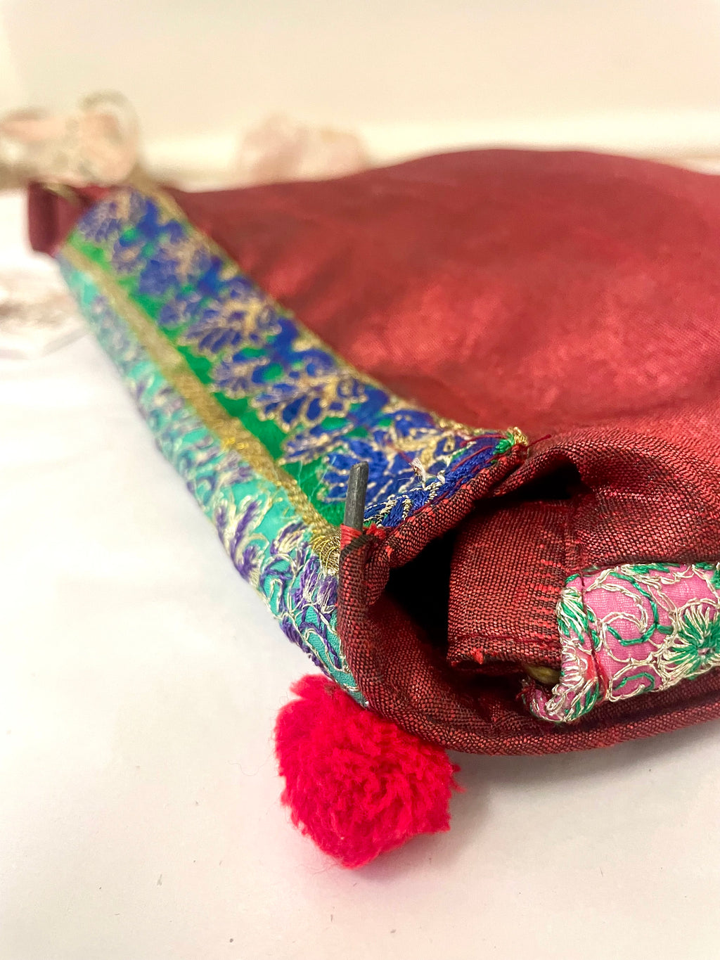 Bright Patchwork Shoulder Bag with Pom Pom details