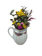 Vintage small creamer with bright floral design