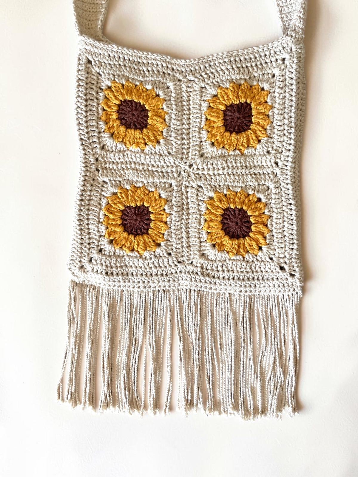 Crochet sunflower cross body bag with fringe