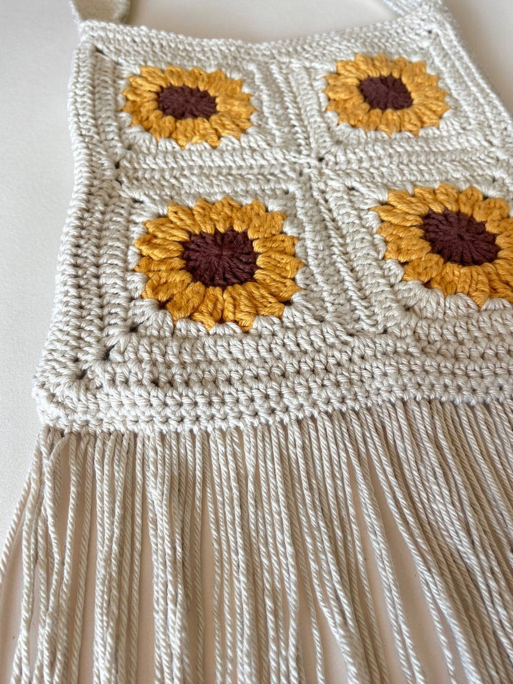 Crochet sunflower cross body bag with fringe